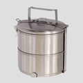A stainless steel tiffin carrier with a handle on top and two compartments with lids.