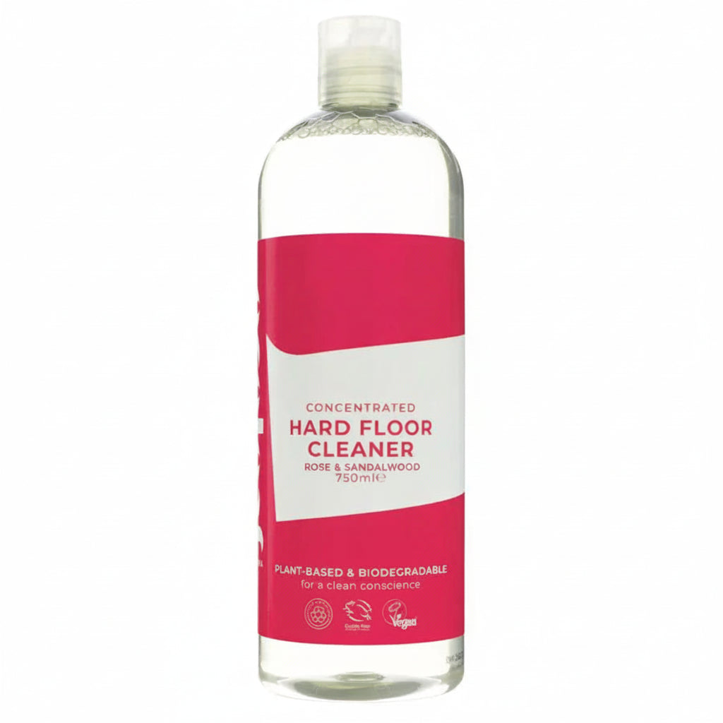 A 750ml bottle of Hard Floor Cleaner concentrated liquid, featuring a clear bottle with a white and bright pink label, set against a plain white background.