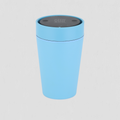 A light blue cylindrical travel cup with a dark gray lid, shown on a light gray background.