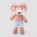 Knitted toy ram in bue and white stripe shorts