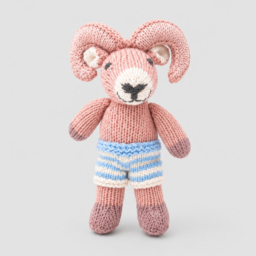 Knitted toy ram in bue and white stripe shorts