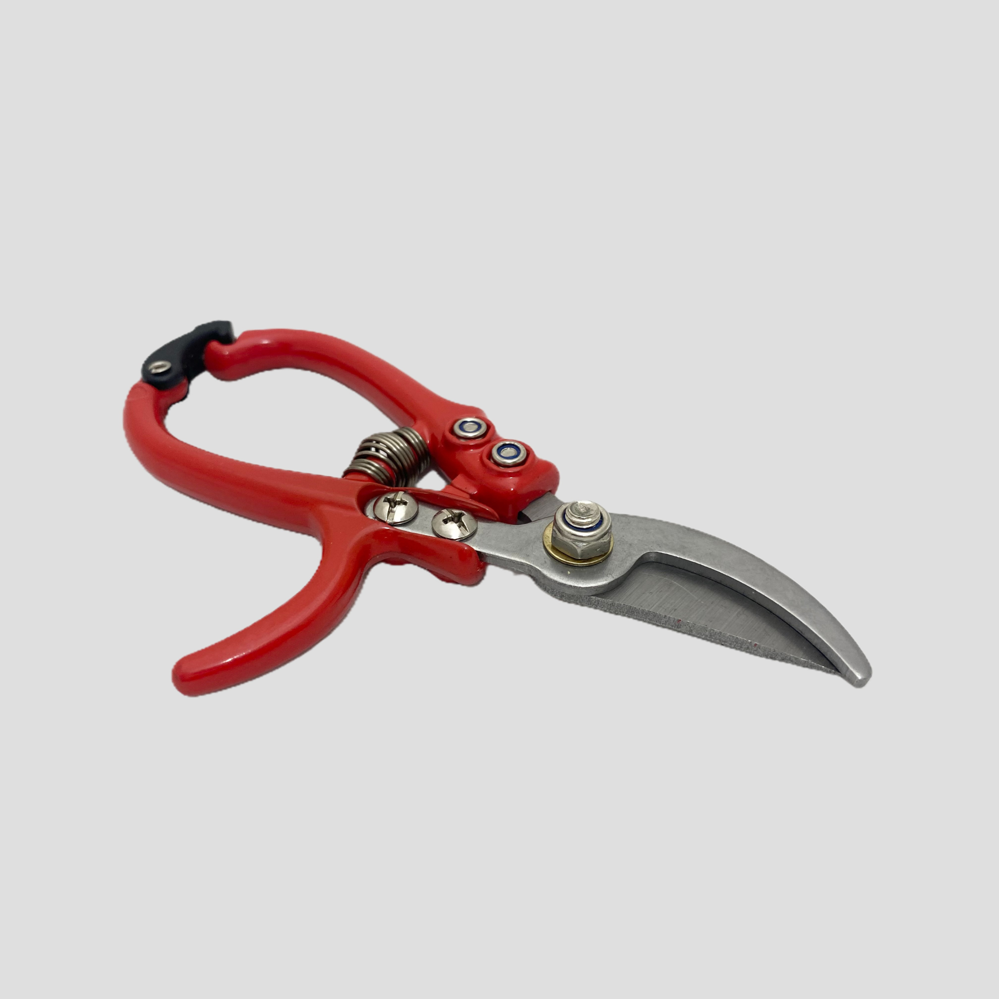 Red and silver pruning shears with a black rubber grip on the handle, shown on a solid gray background.