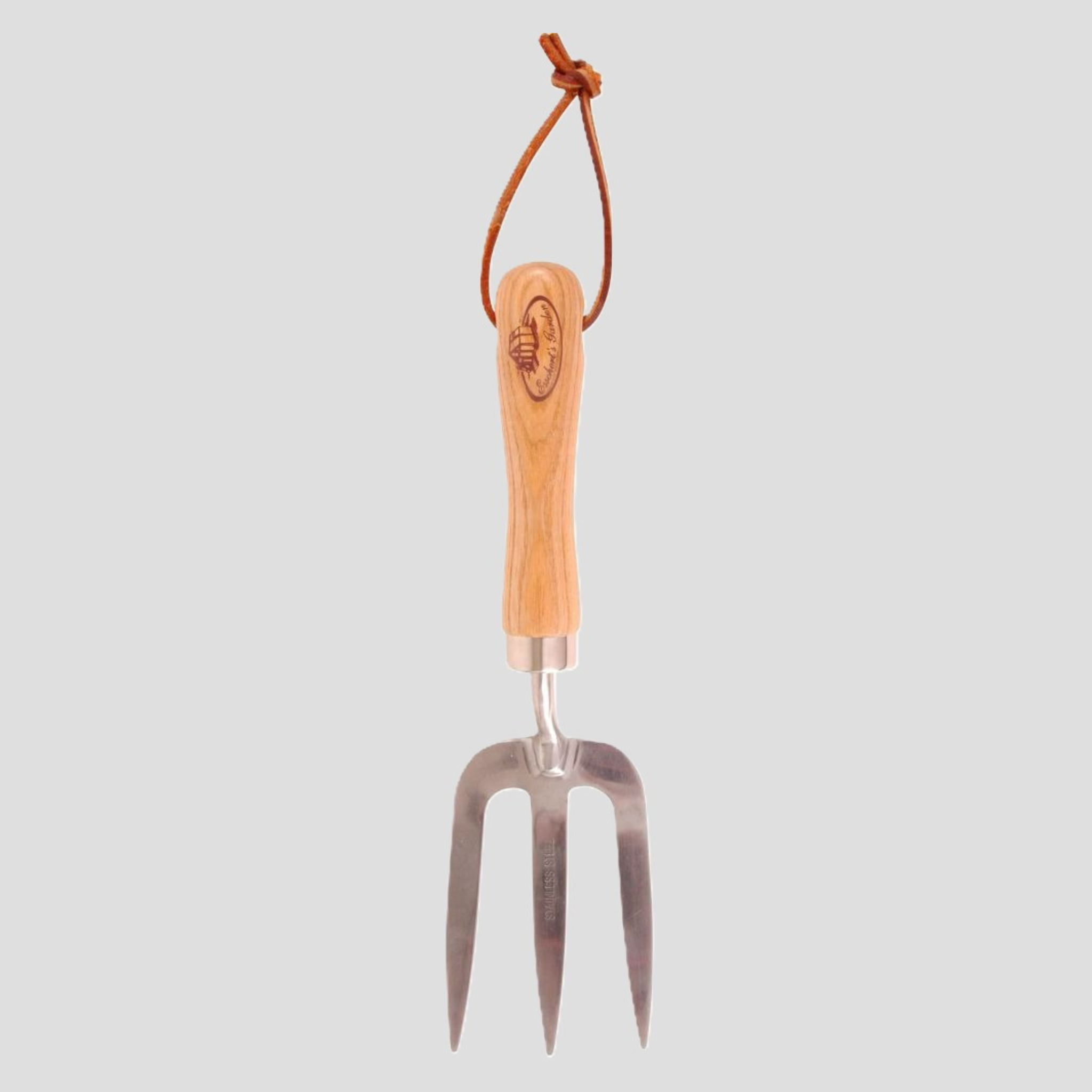 A small garden hand fork with a light-colored wooden handle and a brown leather hanging loop, shown against a solid light gray background.
