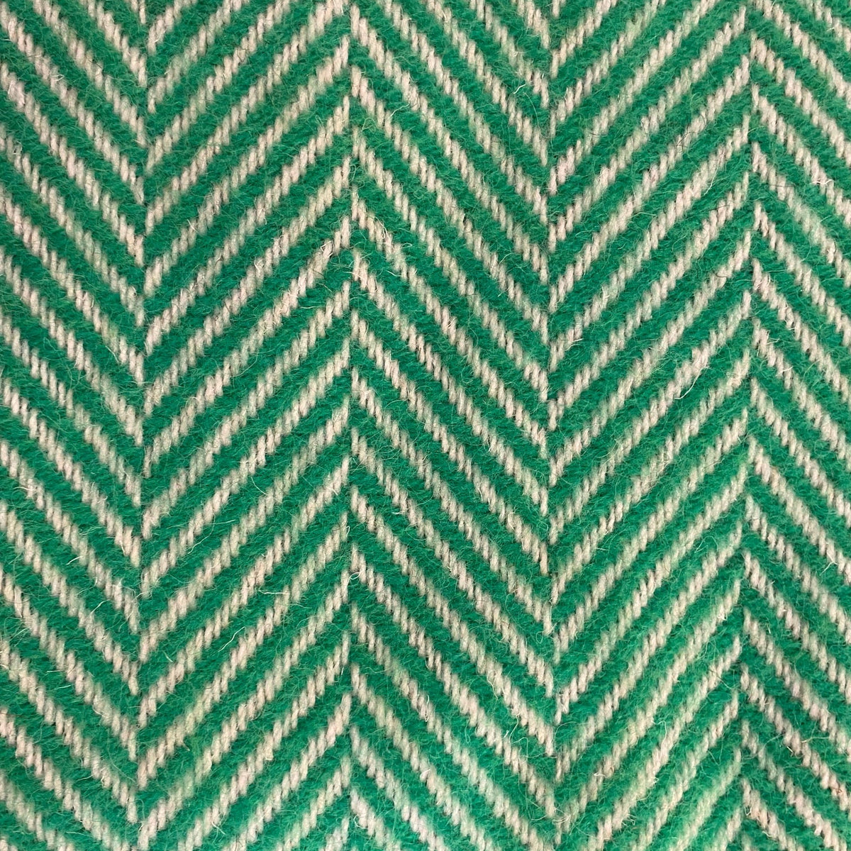 Green and beige herringbone pattern blanket