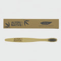 Bamboo toothbrush with 'Alter/native' branding on a white background
