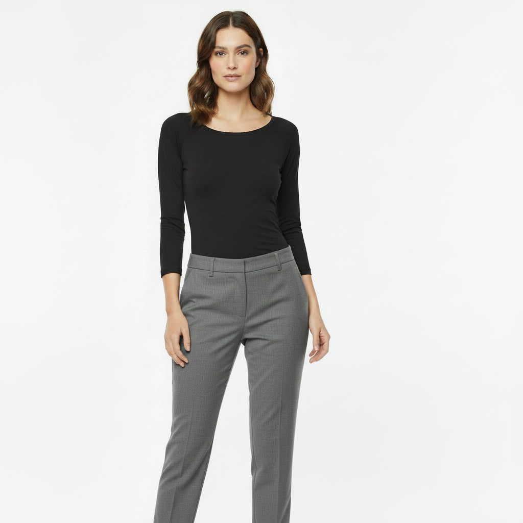 woman wearing a black 3-4 length sleeve t shirt