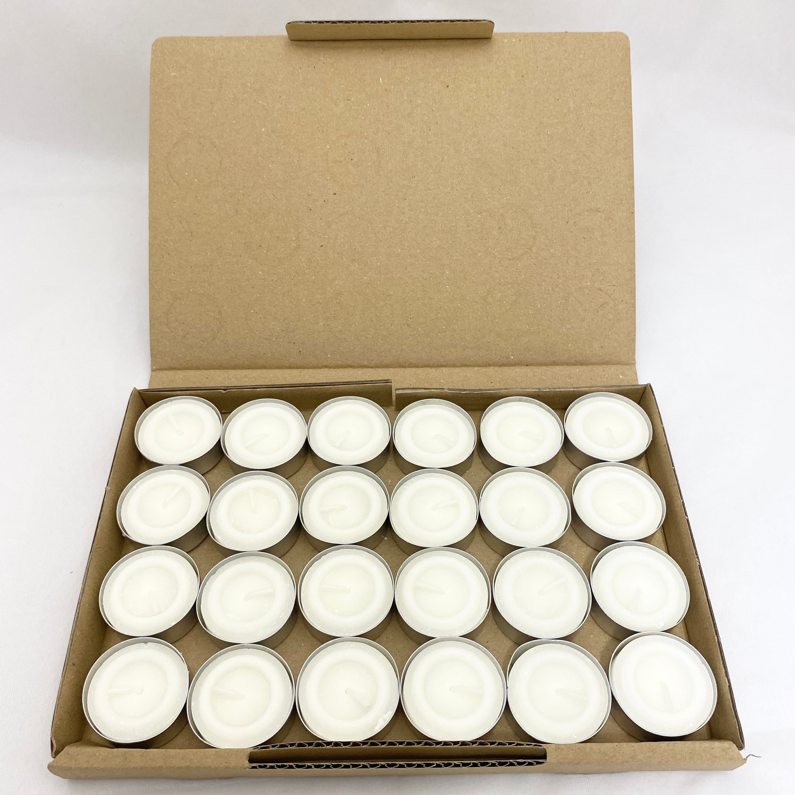 A cardboard tray filled with 20 small white tea light candles, shown with the lid open against a plain white background.