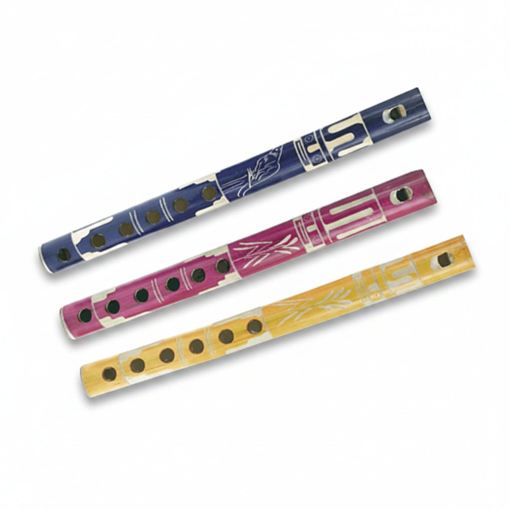 Three colorful wooden flutes on a white background