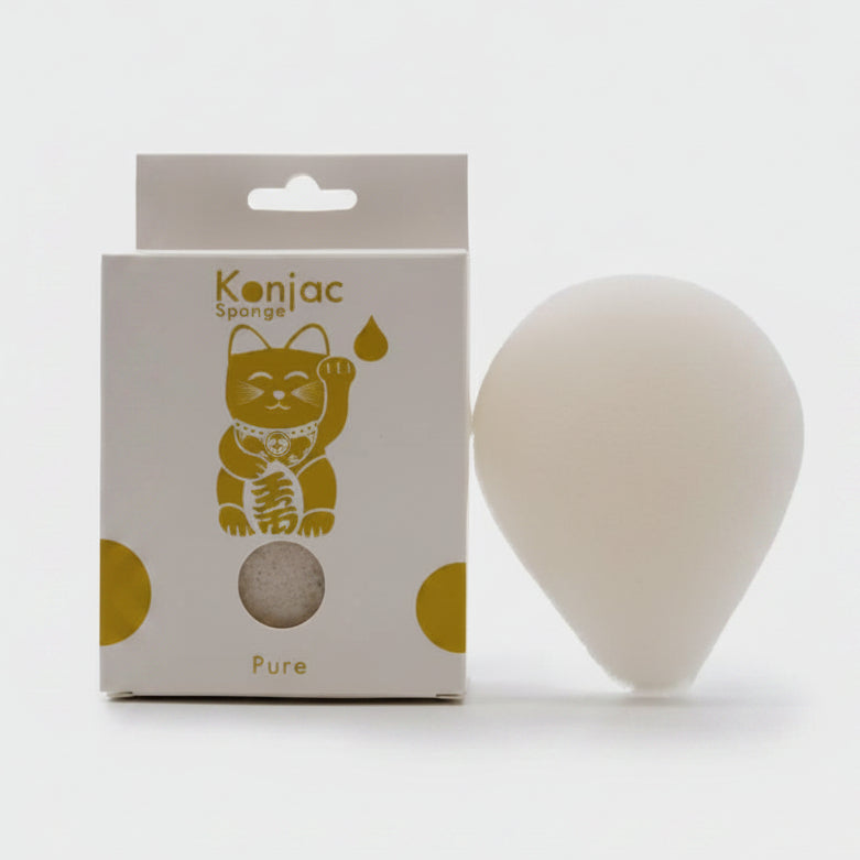 Konjac sponge with packaging featuring a cat illustration on a white background