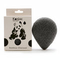 Konjac sponge with packaging on a white background