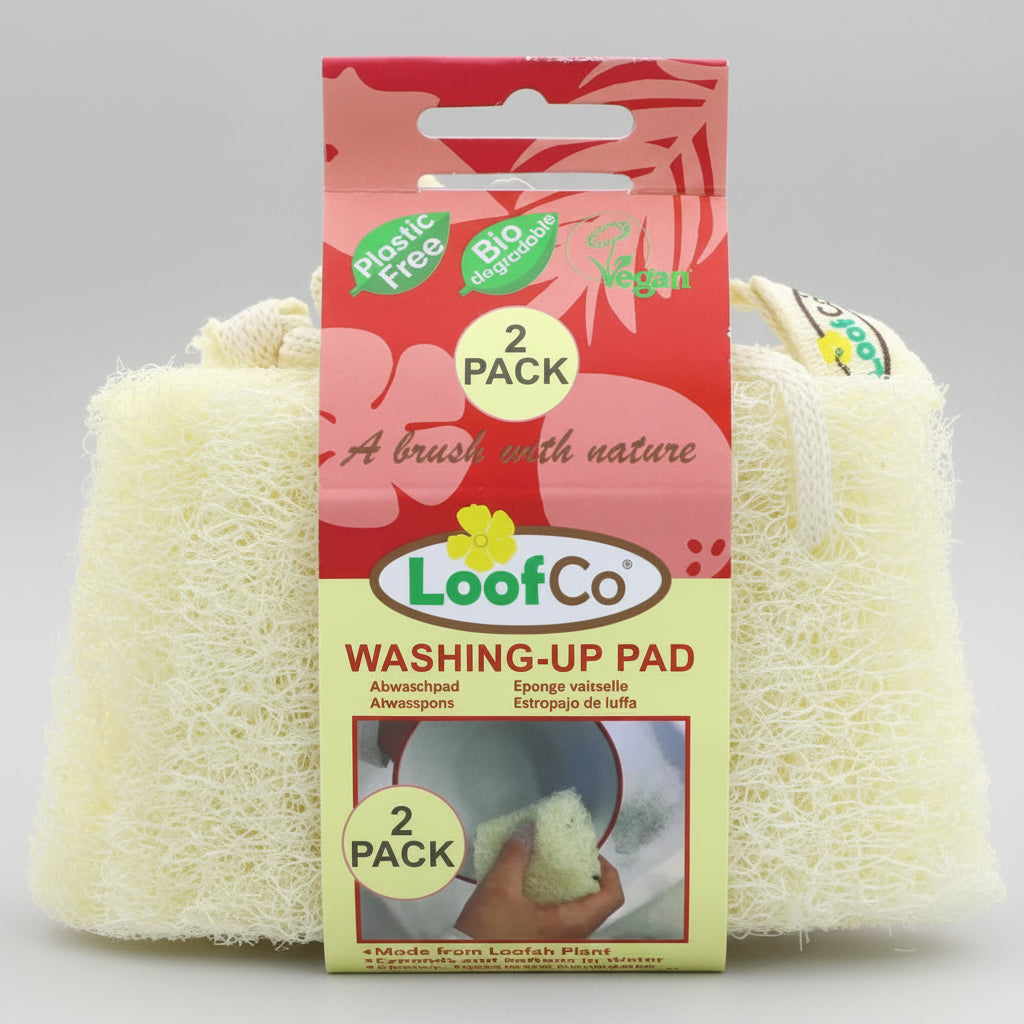 A 2-pack of LoofCo Washing-Up Pads in a red and yellow hanging retail package, with the pale yellow sponge pads visible behind the card.