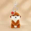 Plush meerkat keychain with a tag on a white background