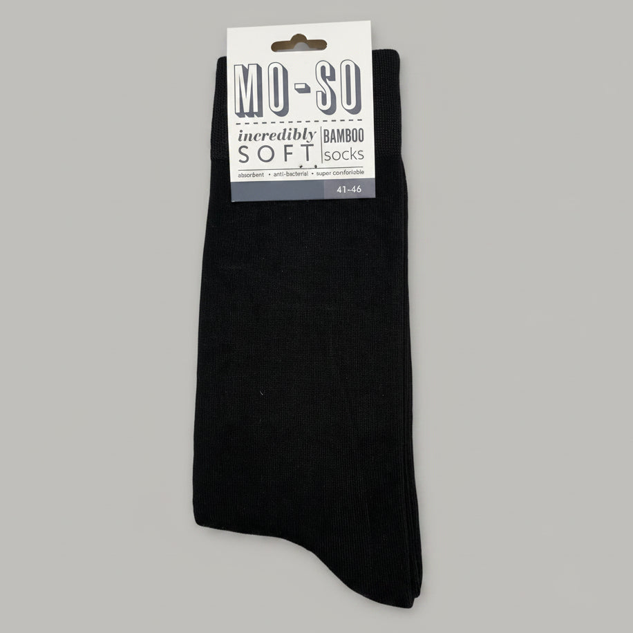 a pair of black mo-so socks 41-46 on a grey background