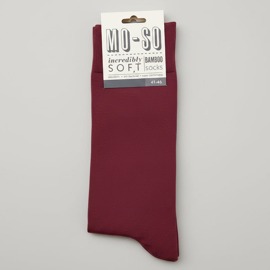 a pair of claret mo-so socks 7-11 on a grey background
