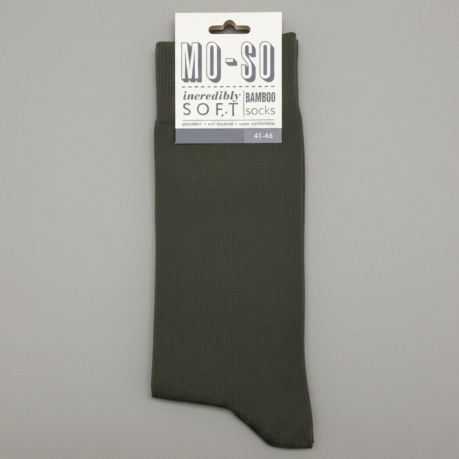 a pair of khaki mo-so socks on a grey background