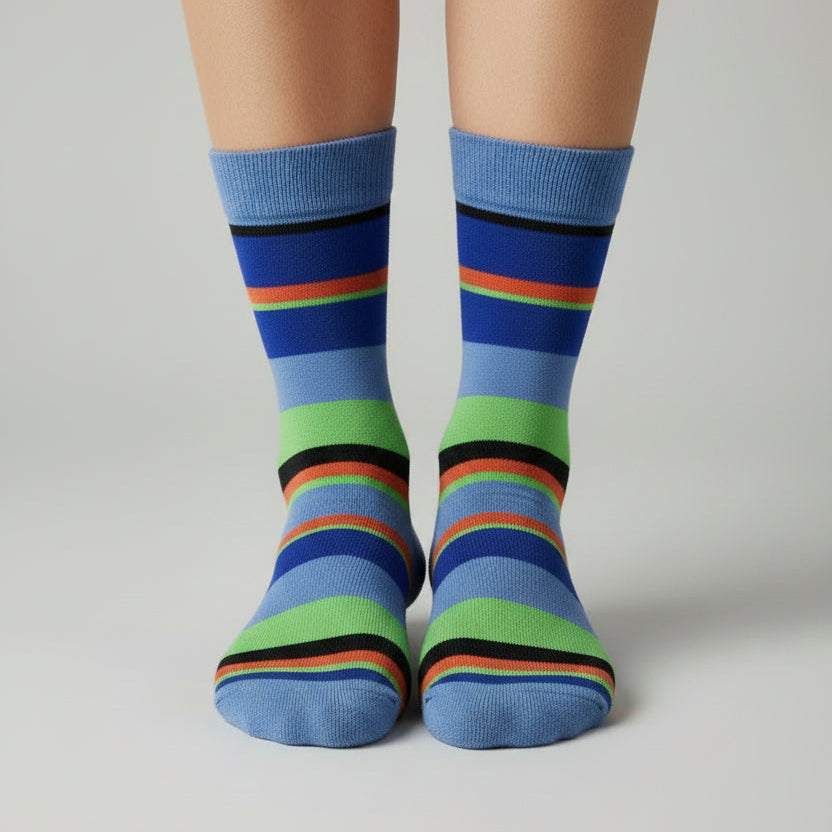 A pair of men's Moso bamboo socks with blue stripes, size 11-13, displayed on a cardboard stand.