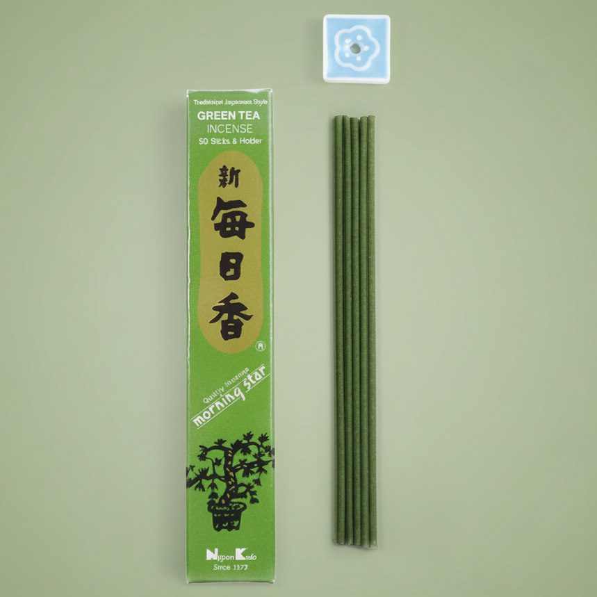 Green tea incense packaging with incense sticks on a green background