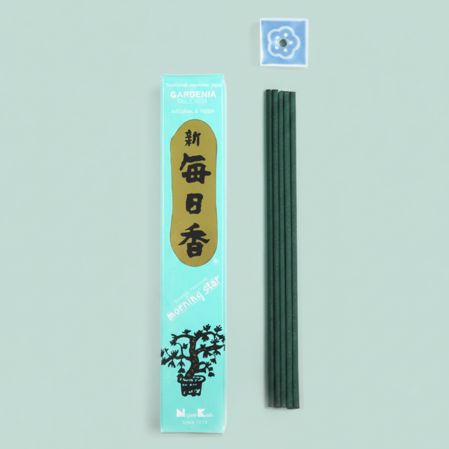 Incense sticks with packaging on a blue background
