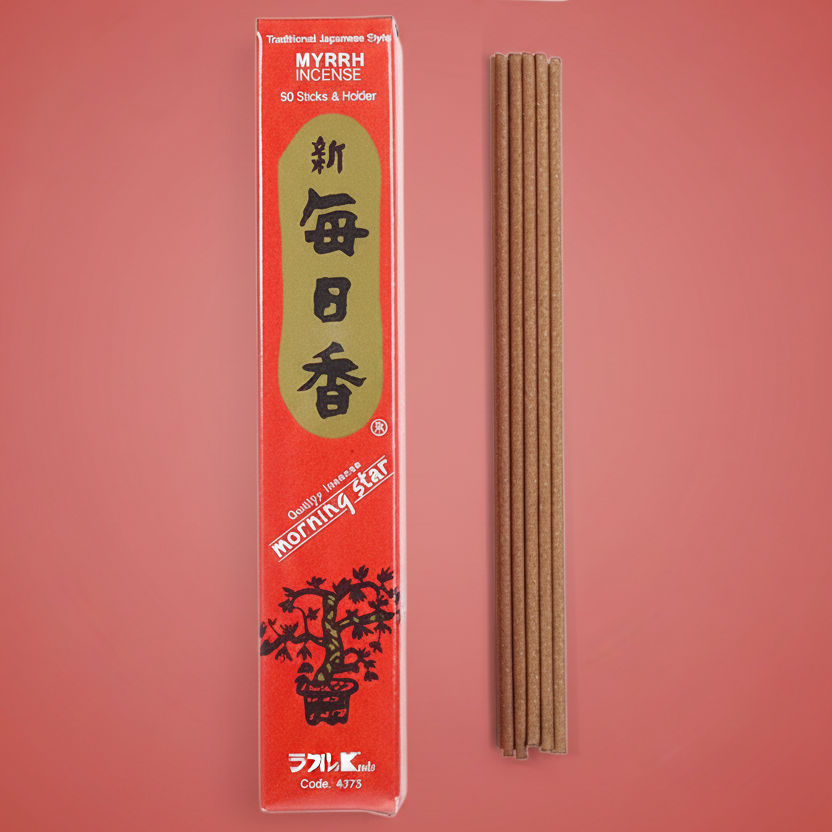 Incense sticks with packaging on a terracotta background