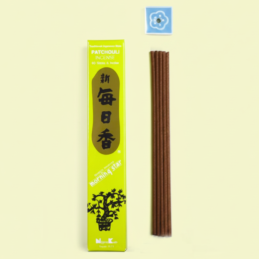 Incense sticks with packaging on a lemon background