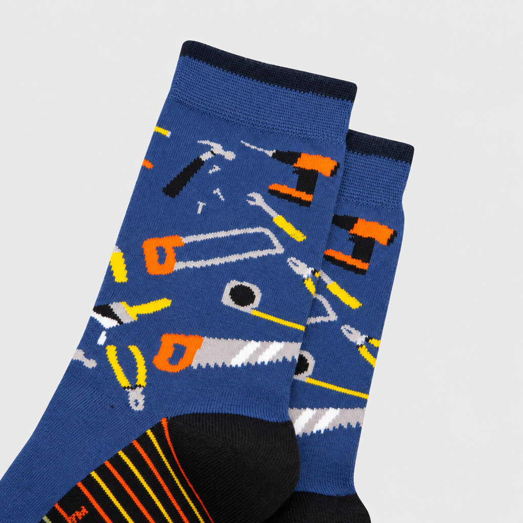 Blue socks with tool pattern on a white background