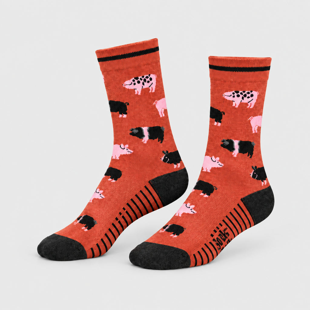Sock terracotta colour with pig pattern on a grey background