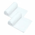 Two white baby swaddles arranged on a plain grey background.