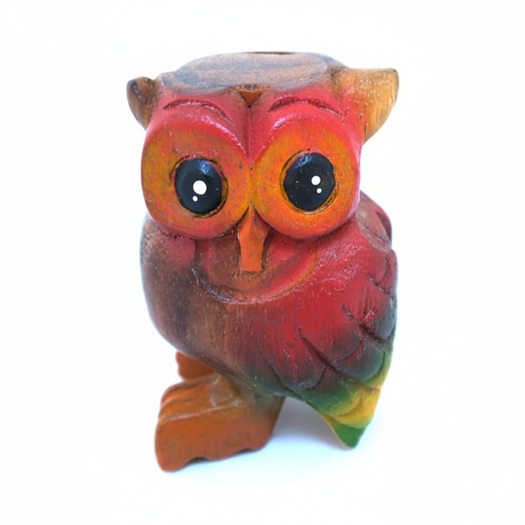 Colorful owl figurine on a white background