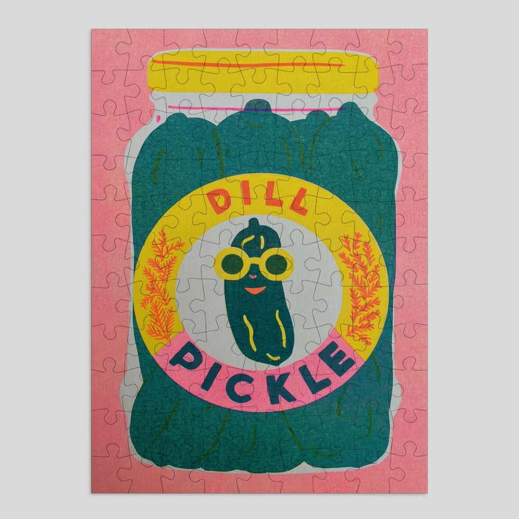 Jigsaw puzzle with a dill pickle design on a pink background