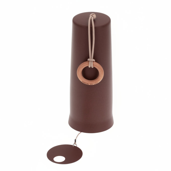 brown metal windchime with wooden hanging ring