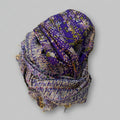 A purple silk sari scarf with floral patterns and kantha stitching, displayed on a neutral background.