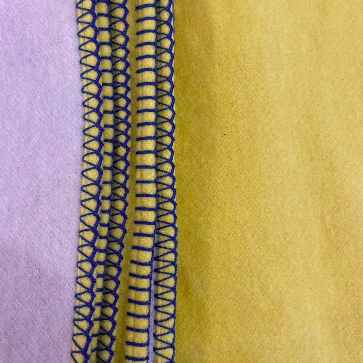 recycled cotton blanket budgie yellow and cream on the reverse