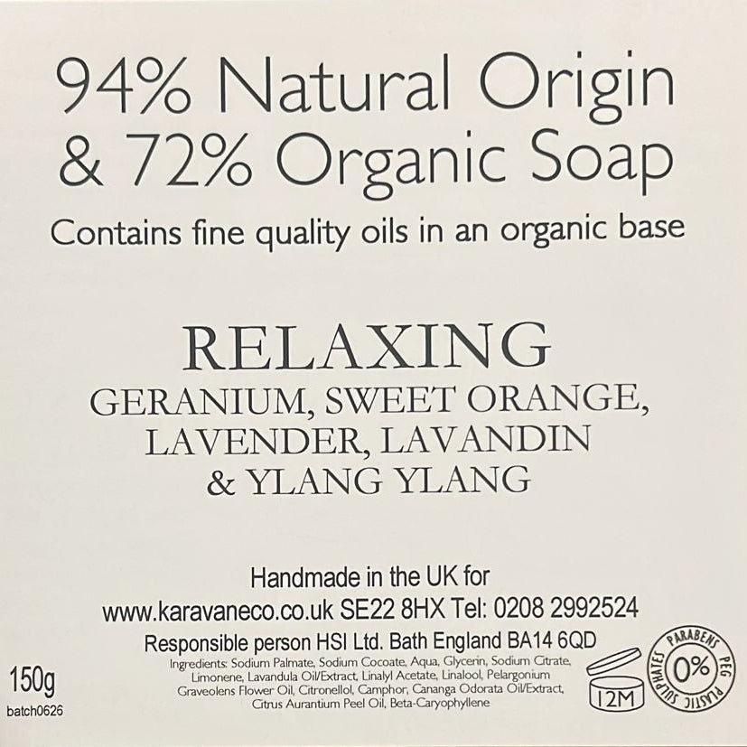 A 150g bar of organic soap in a brown kraft paper box, featuring a white label that reads 'RELAXING' with ingredients Geranium, Sweet Orange, Lavender, Lavandin, and Ylang Ylang.