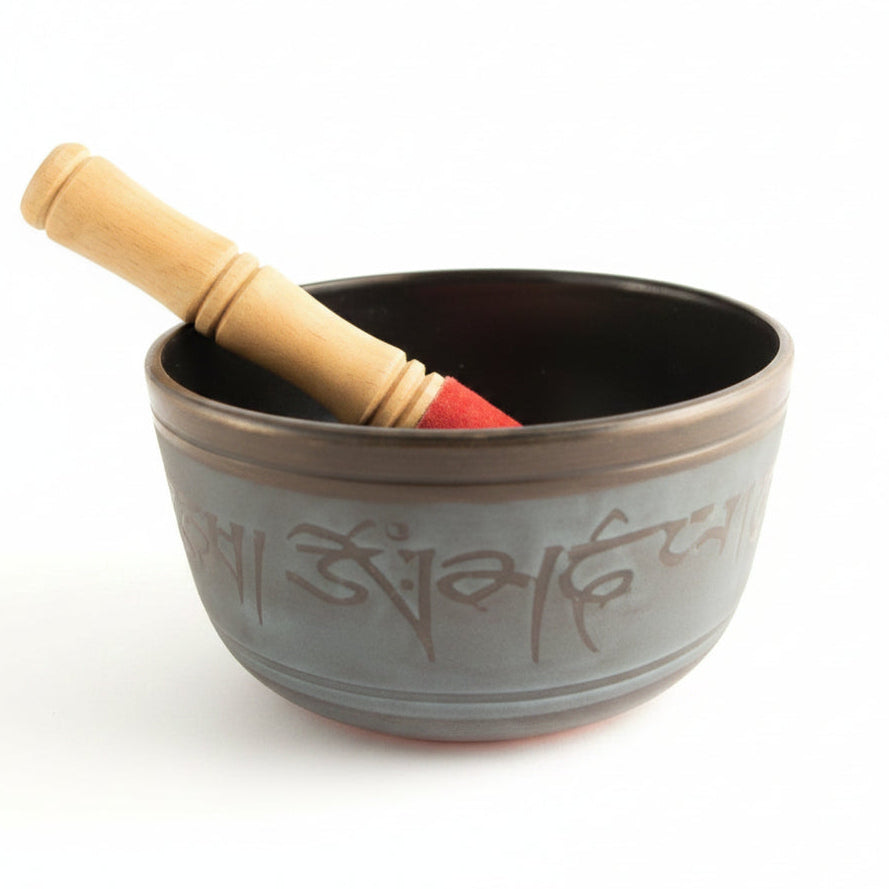 blue singing bowl with beater