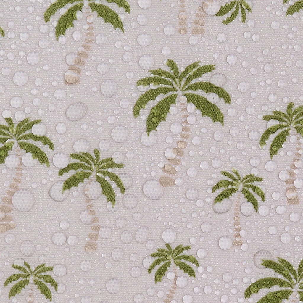 A close-up of a fabric pattern featuring green palm trees and raised white water droplets on a light beige background.