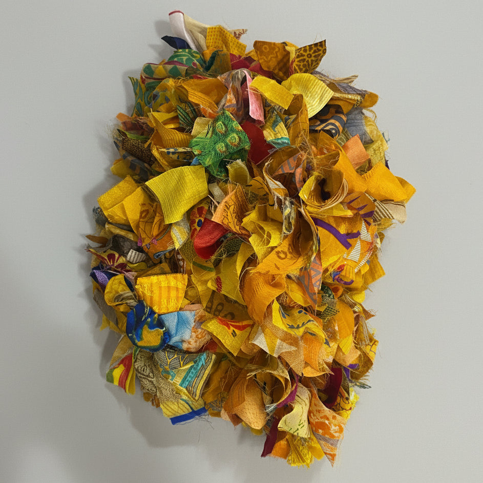 Colorful fabric garland on a grey background