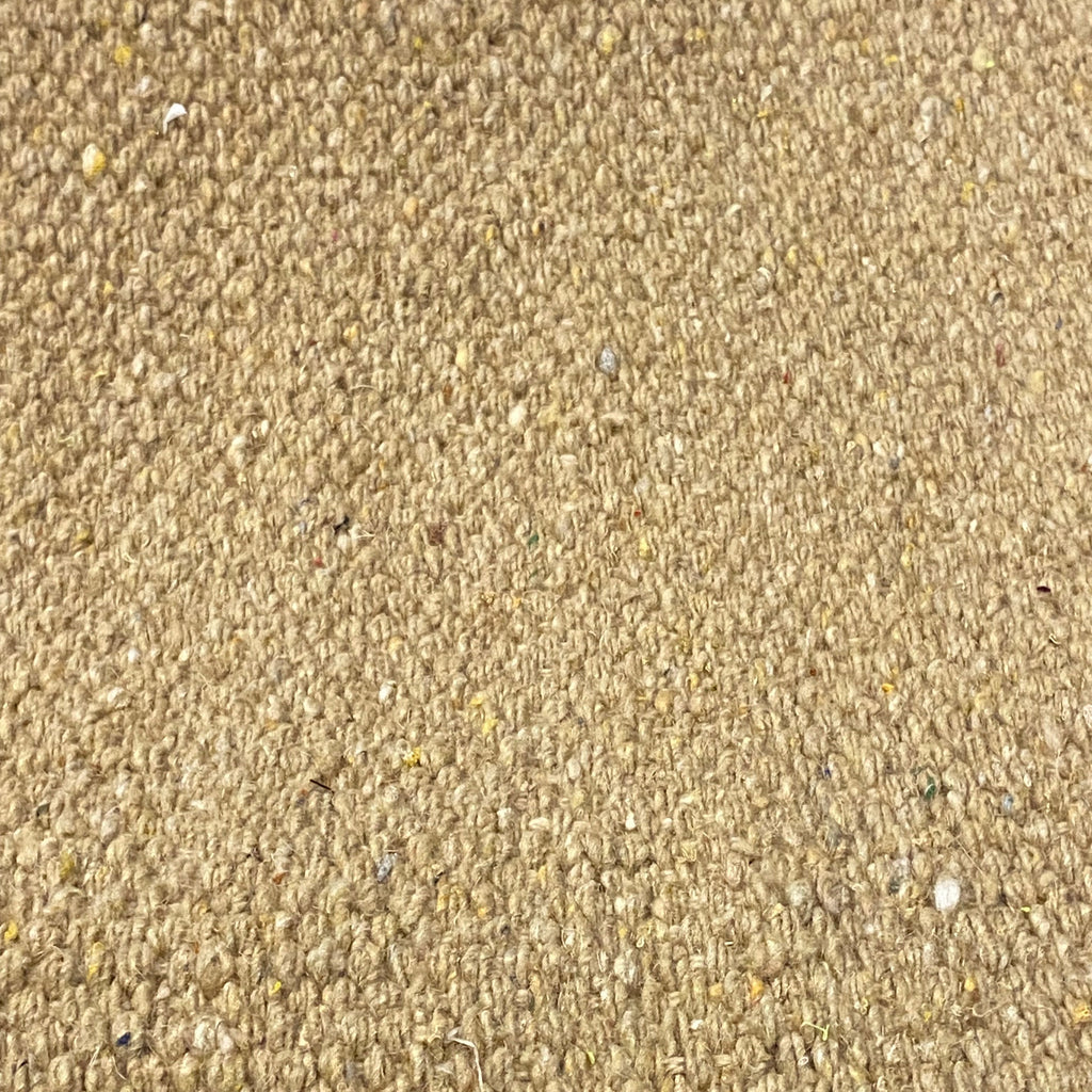 Close-up of beige textured rug