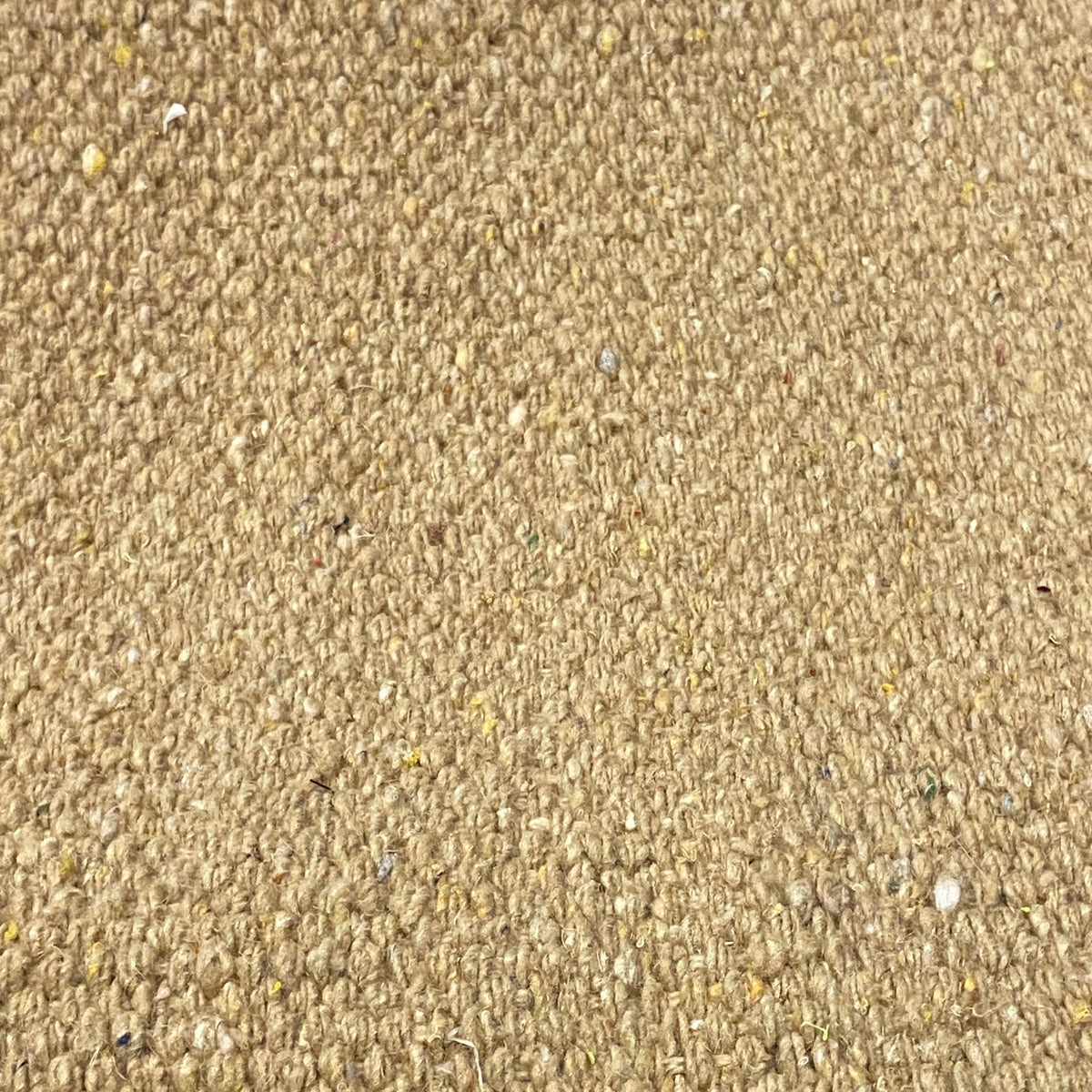 Close-up of beige textured rug