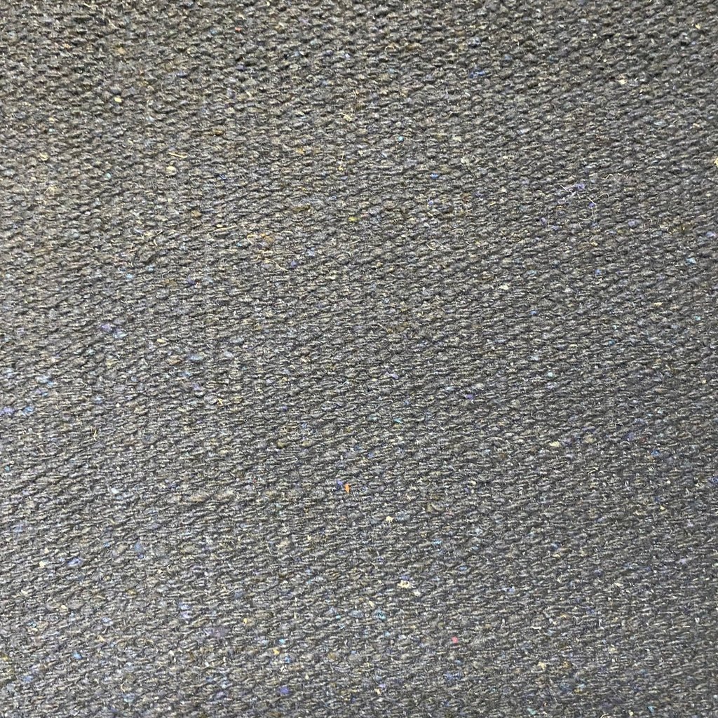Close-up of dark grey textured rug