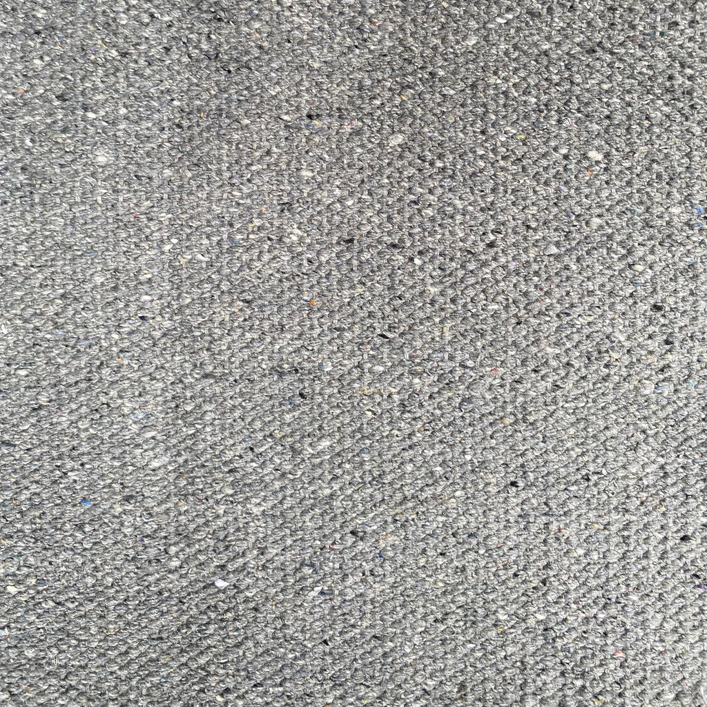 Close-up of grey textured rug