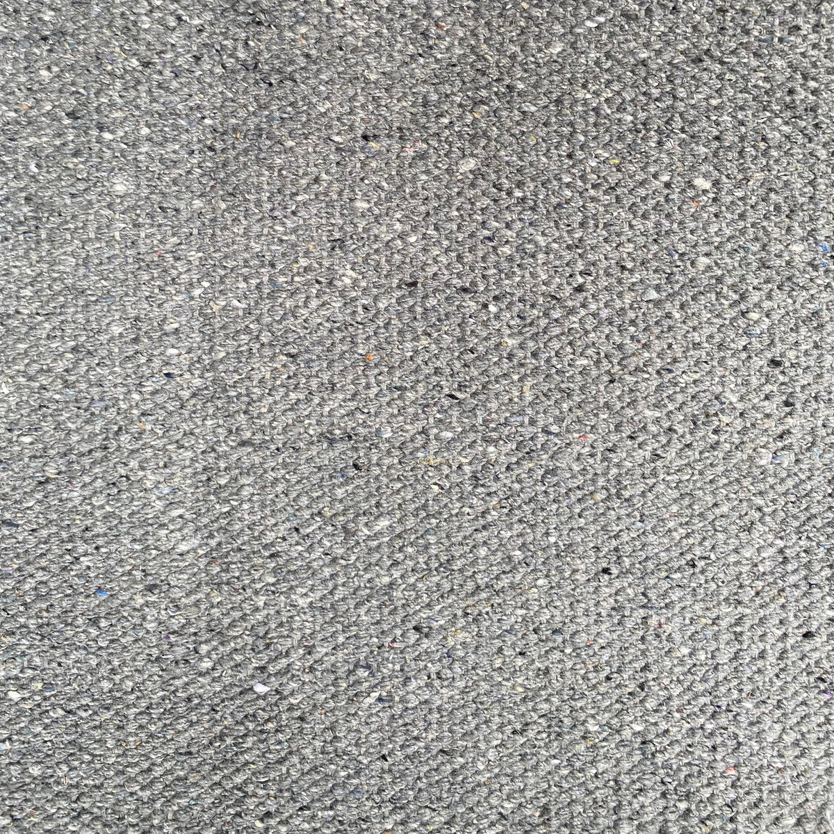 Close-up of grey textured rug