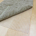 grid based non slip underlay for rugs