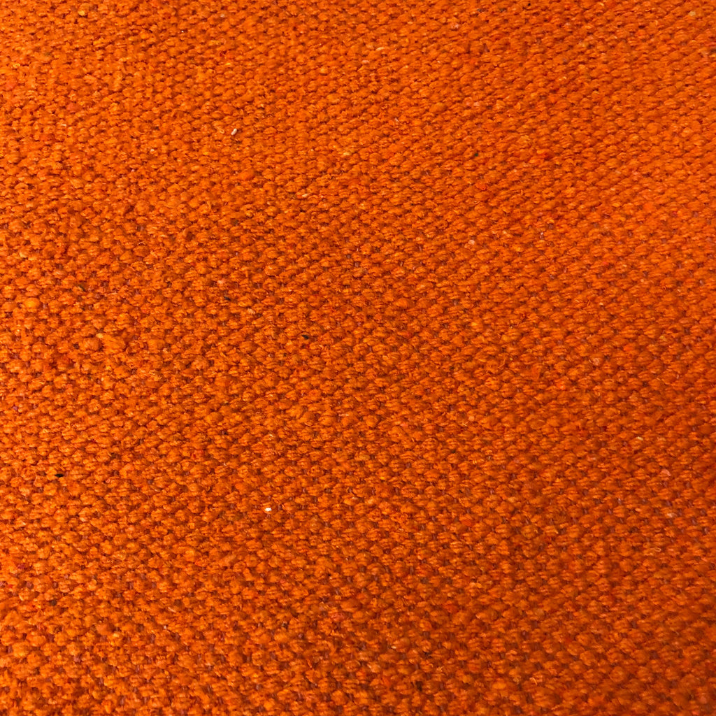 Rust detail of cotton rug
