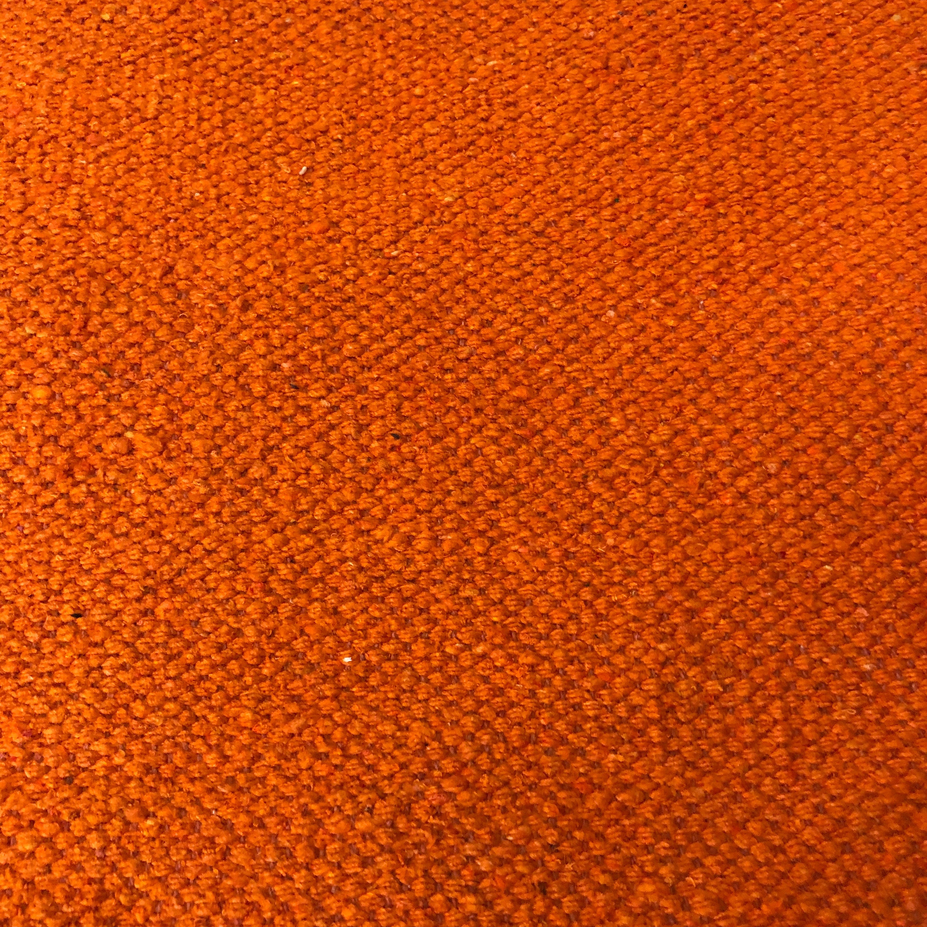 Rust detail of cotton rug