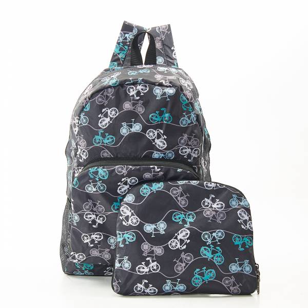 A backpack and a front pocket with a bicycle pattern on a dark background. The backpack is open, showing the compartments and the zipper closure.