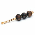 black hosho seed shaker, the pods on a stick

