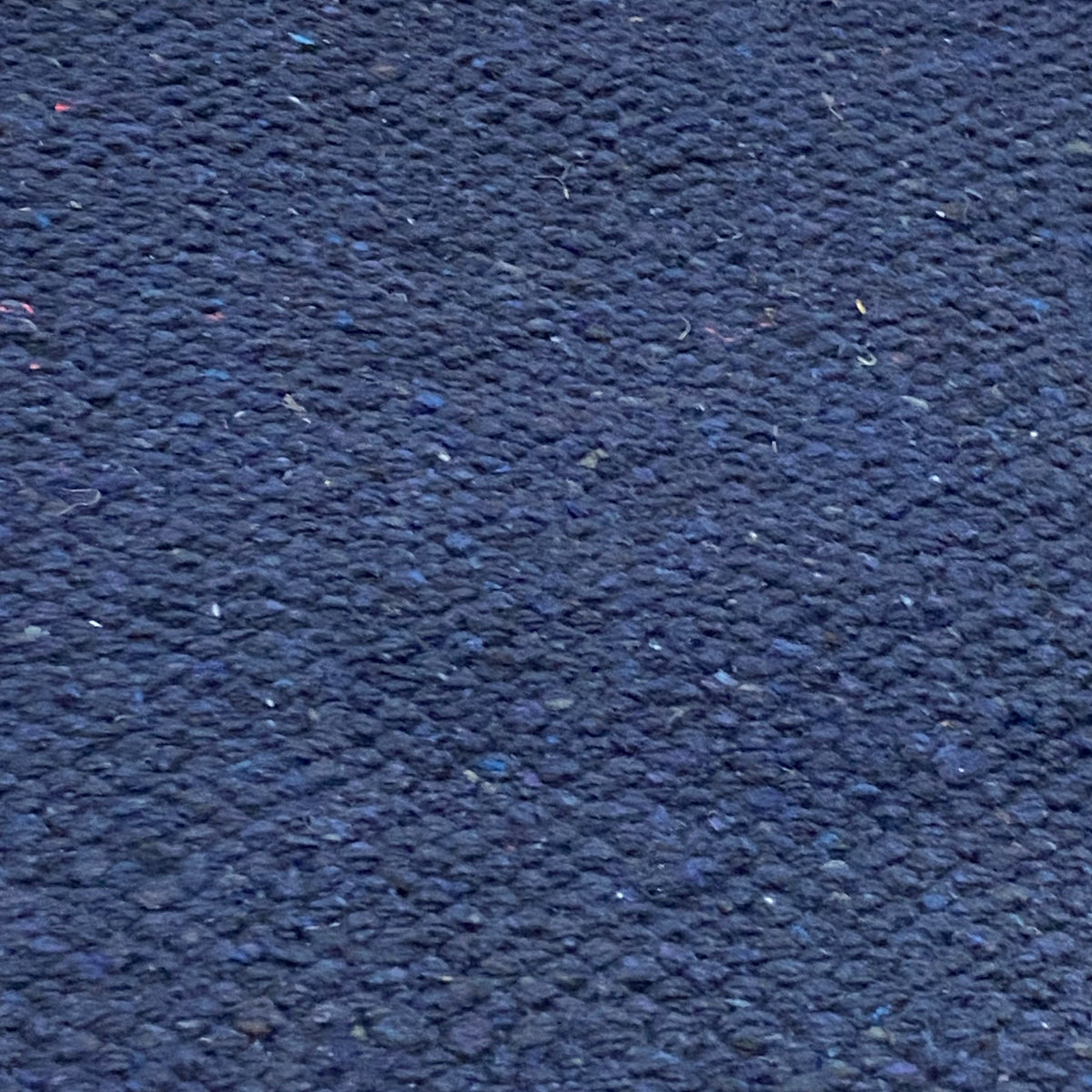 Close-up of blue textured rug