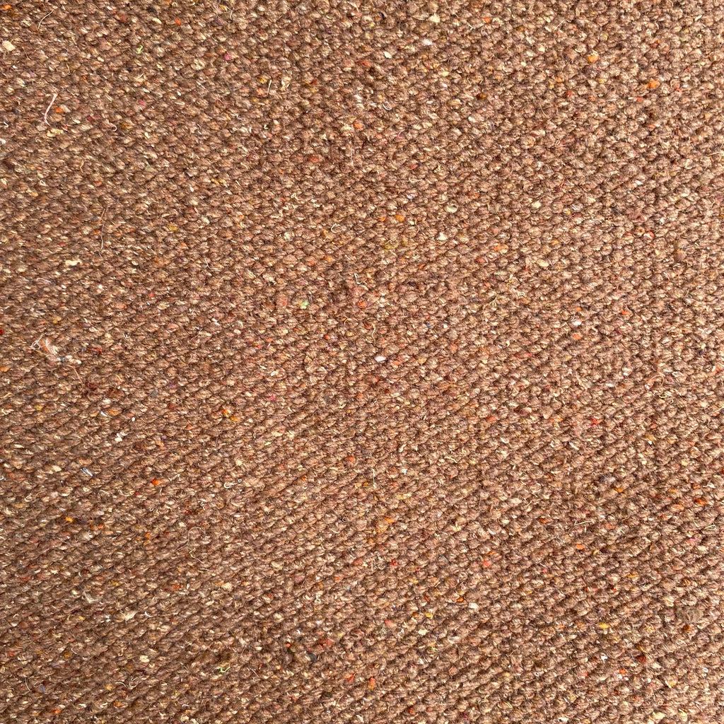 Close-up of camel textured rug