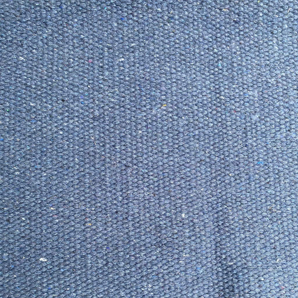 Close-up of denim textured rug