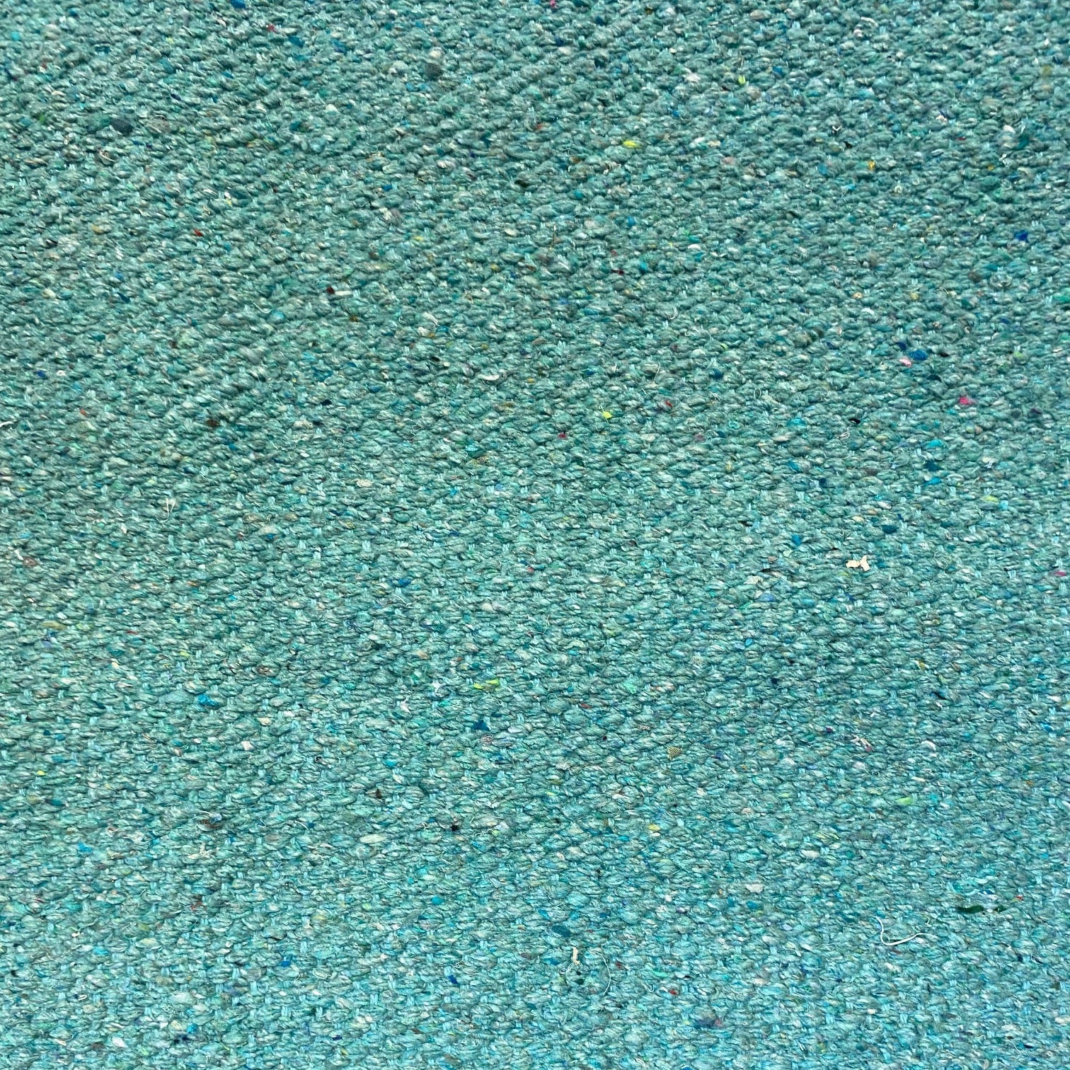Close-up of duck egg textured rug